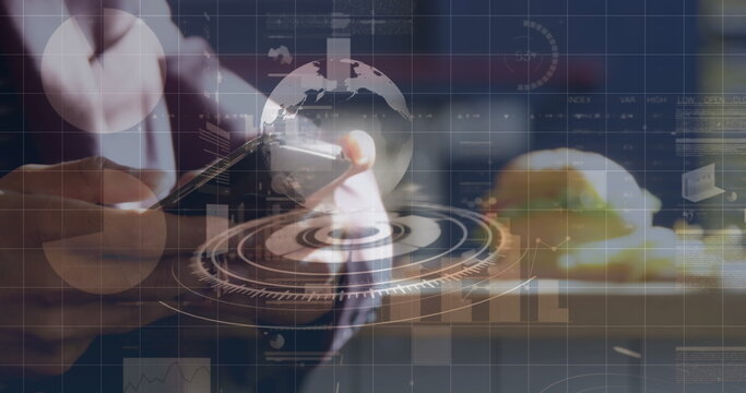 Data processing and globe over a round scanner against mid section of a person using smartphone