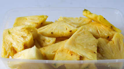 pineapple slice in the plastic box 