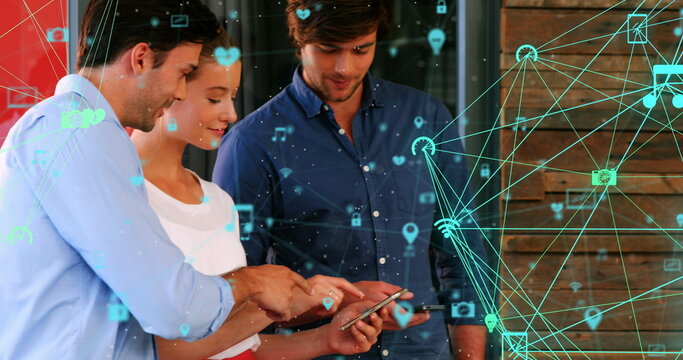 Image of connected icons globes over diverse coworkers discussing and using smartphone