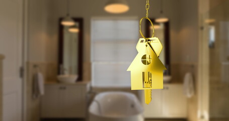 Image of golden key with house shape over bathroom