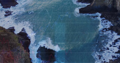 Image of financial graphs and data over sea and land top view