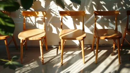 Elegant close-up of realistic shadows imitating tree foliage next to wooden chairs, calm and serene interplay of light, isolated background