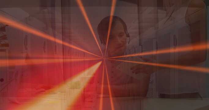 Image of qr code, lines over caucasian coworkers working