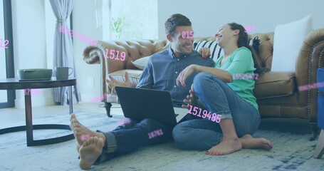 Image of data processing over caucasian couple using laptop - Powered by Adobe
