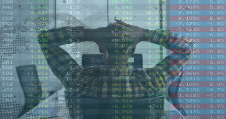 Image of financial data processing over businessman