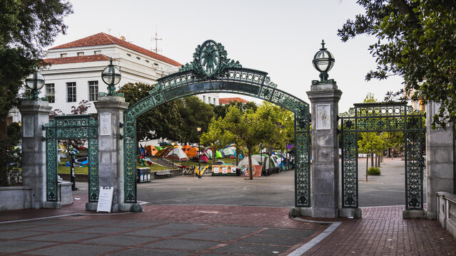 Berkeley, California, USA. May 5 2024: A photo of Palestinian protesters camping on the UC Berkeley campus in front of Main gate, Sather Gate, in the early morning of 2024.	
