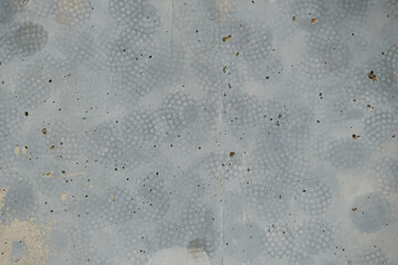 concrete wall with ball marks