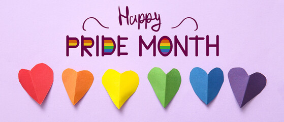 Colorful hearts made of paper on lilac background. LGBT concept