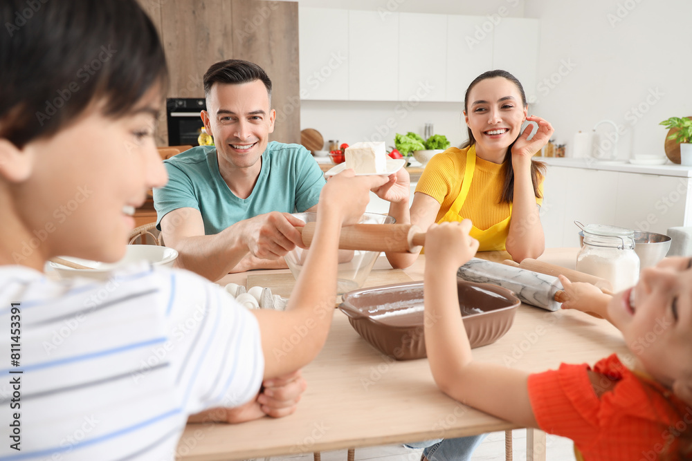 Poster Happy family cooking in kitchen