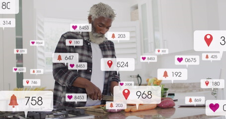 Image of multiple notification bars, senior african american man cutting vegetables in kitchen