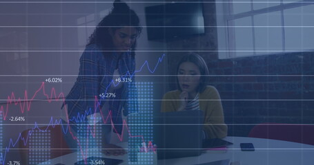 Image of statistical data processing against two diverse women over laptop discussing at office