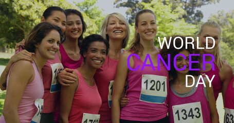Obraz premium Image of world cancer day over happy diverse sportswomen