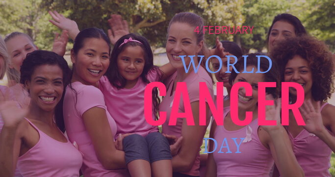 Image of world cancer day over happy diverse women waving at camera