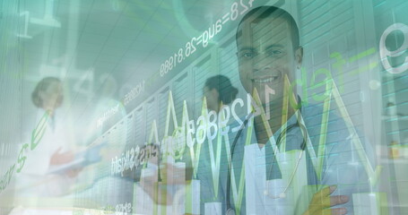 Image of financial data and graphs over happy biracial male doctor