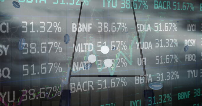 Image of stock market data processing and multiple argentina printed rugby balls falling