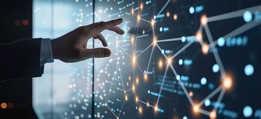 Businessman touching a digital screen with a virtual graph and icon of a network connection, representing a data transfer technology concept.