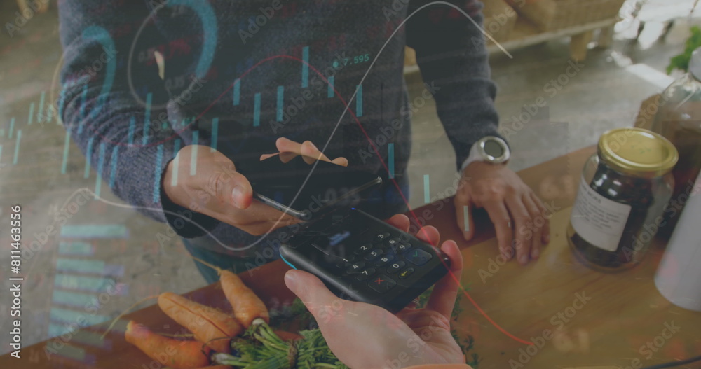 Poster image of data processing over mid section of man using smartphone to make payment at a cafe