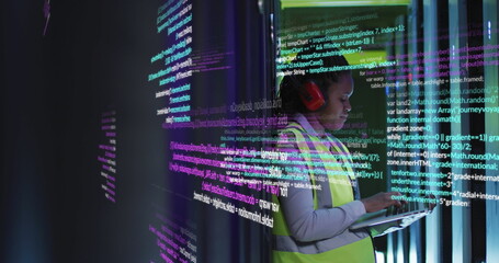 Image of data processing on african american female engineer using laptop working at server room
