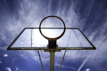Basketball basket in a field