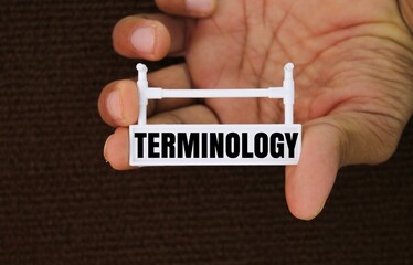 signs with terminology words. the body of terms used with a particular technical application in a...