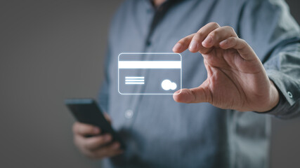 Hands holding digital credit debit card and using keyboard on laptop at home. Online shopping ,network banking account payment money for buy or purchase and sale concept.