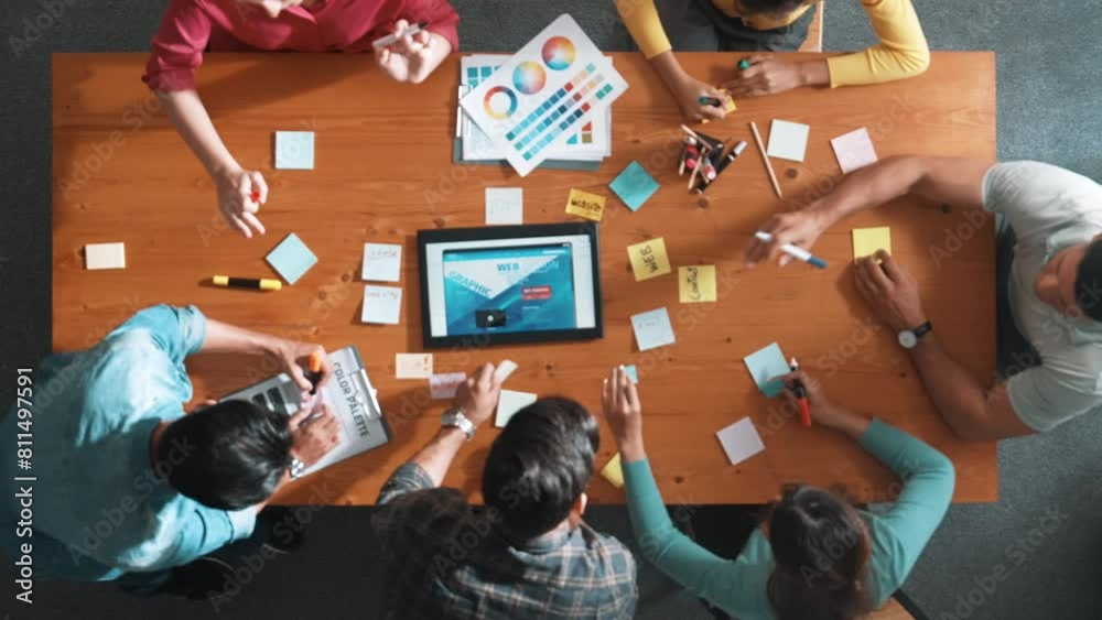 Poster top view of skilled business people working together to design web design. aerial view of designer b