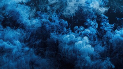 Smoke of a blue hue against a black backdrop