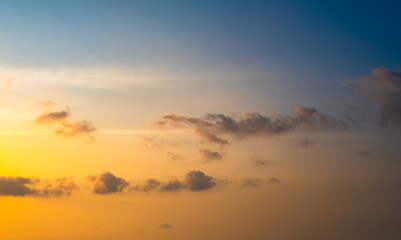 Enjoy a panoramic view of the skyline. The sun rises in the morning sky with colorful clouds. and beautiful cloud patterns In the soft light of the morning	