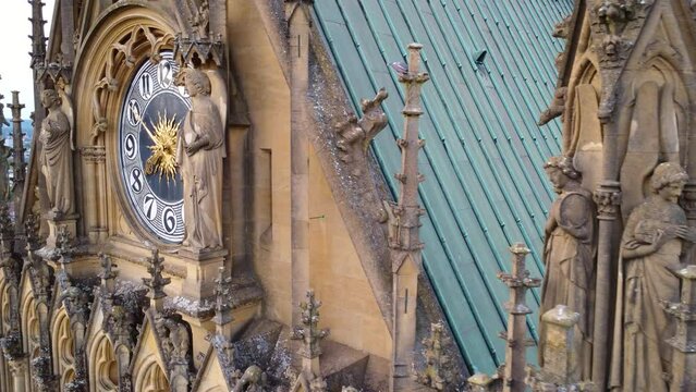 Close-Up of Large Clock and Roof of Metz Cathedral in France