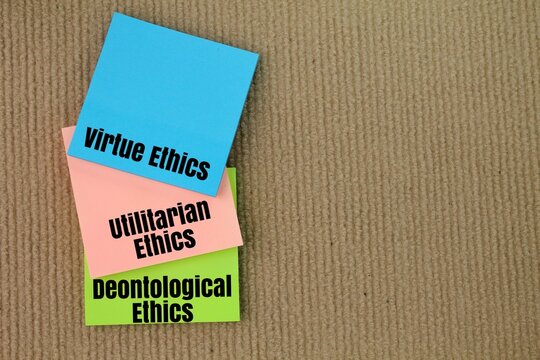 kertas berwarna dengan perkataan Virtue Ethics, Utilitarian Ethics dan Deontological Ethics. three theories of ethics
