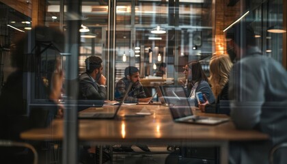 An HR team brainstorming in a conference room, developing innovative ways to reach new talent
