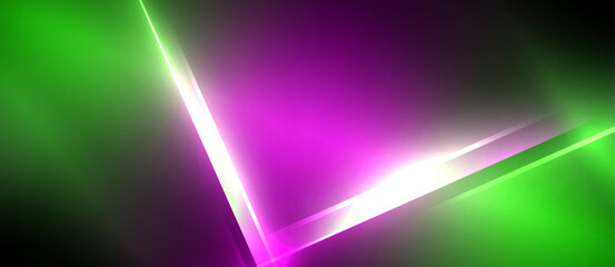 Obraz premium The colorfulness of purple, violet, and magenta lights against a black background creates an artful display reminiscent of neon technology. Electric blue hues add a touch of brightness to the scene