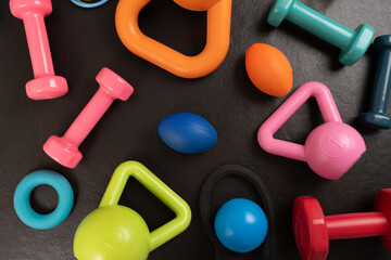 close up exercising sport equipment on the table background, healthy and workout concept