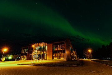 Obraz premium Northern Lights in Valmiera. Aurora Borealis or Northern Lights Latvia. Northern lights shining in the sky