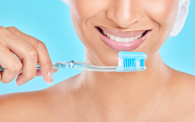 Hands, studio or happy woman brushing teeth with dental toothpaste for healthy oral hygiene....