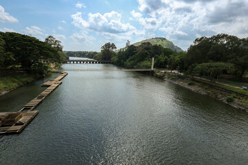 Ropeway in Kerala India. Malampuzha dam view at Palakkad district Kerala South India. Boating at Malampuzha garden hydroelectric dam. Photo taken form ropeway Ariel view of Indian dam. 	