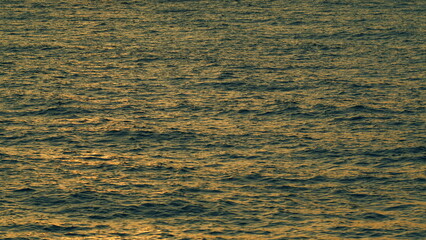 Abstract Summer Natural Background. Sunset Water Texture. View Of Sea During Sunset. Still.