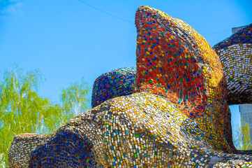 Immerse yourself in a vibrant display of mosaic art. The wall serves as a meeting place for local...