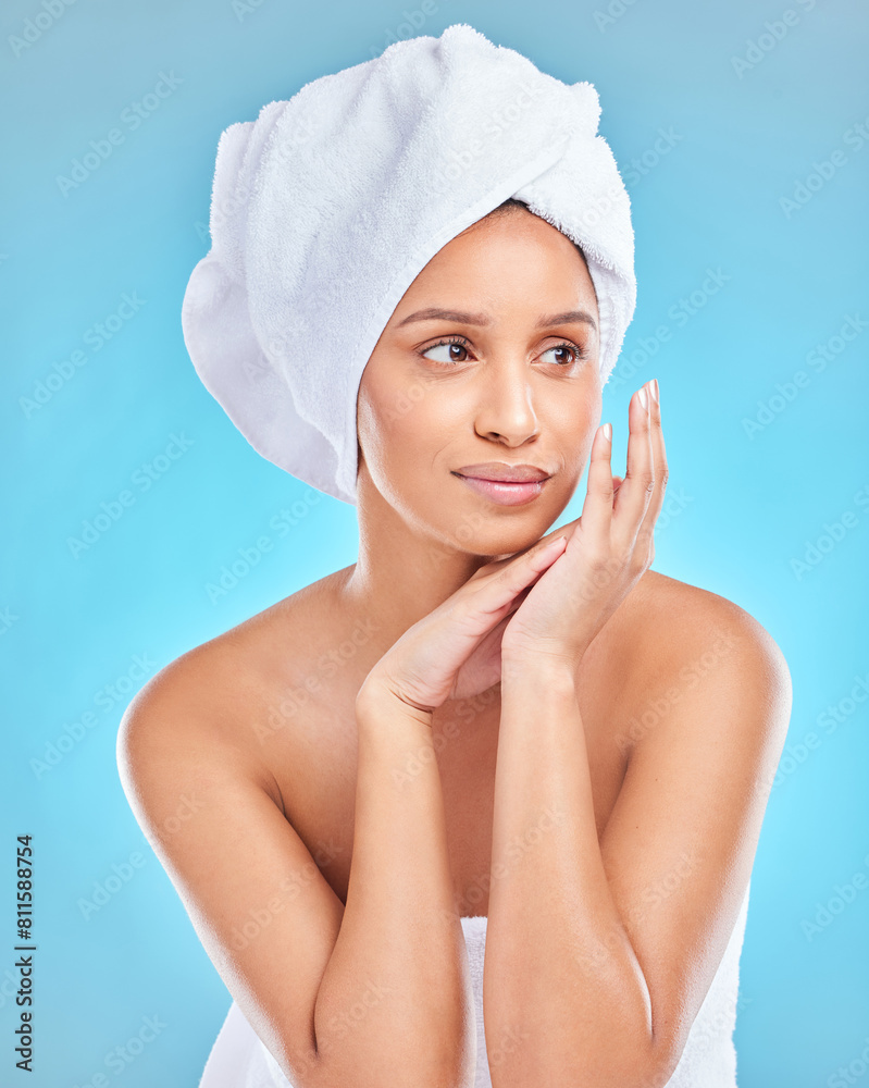 Poster Skincare, beauty or Indian woman with towel in studio facial glow with natural dermatology cosmetics. Morning, blue background and face of girl model thinking of health ideas, cleaning or wellness