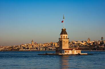Fototapeta premium Maiden's Tower with beautiful sunrise sky in Istanbul, Turkey. (Turkish Name: Kiz Kulesi). Colorful sunrise sky in Istanbul.