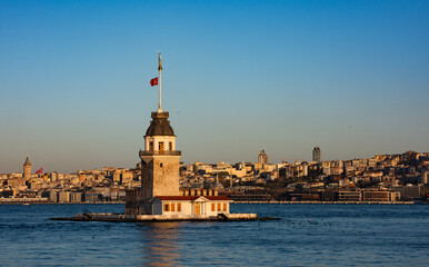 Fototapeta premium Maiden's Tower with beautiful sunrise sky in Istanbul, Turkey. (Turkish Name: Kiz Kulesi). Colorful sunrise sky in Istanbul.