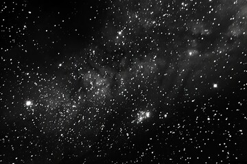 Astronomical object captured in black and white featuring stars in the night sky