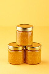 jam in a jar on a colored background