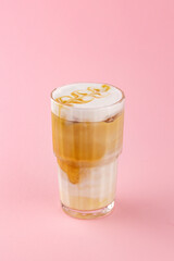 coffee with milk and foam in a glass cup