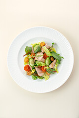 warm salad with steak, vegetables and sauce