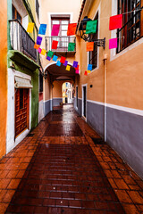 Arch of the Arxius Street in Villajoyosa during the storm
