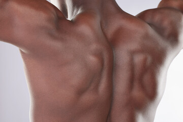 Fitness, man and bodybuilder back for skincare with smooth and healthy skin isolated in studio....