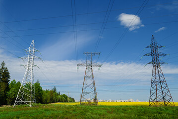 power lines field spring sky beautiful view landscape clouds dangerous area