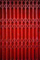 red rusty old antique slide steel door folding metal grille gate