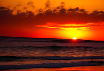 Fototapeta na wymiar A beautiful sunset over the ocean with vibrant orange colors in the sky